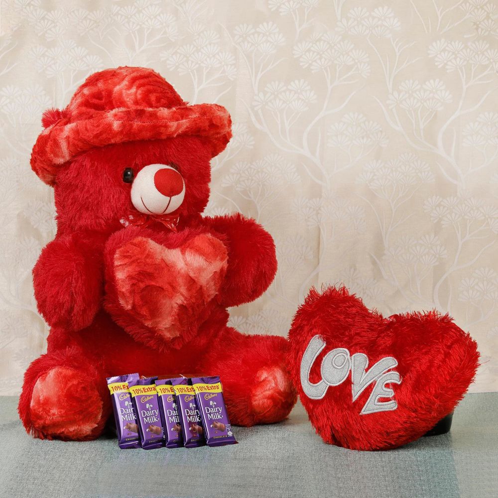 Red teddy cushioned love with dairy milk | Winni.in