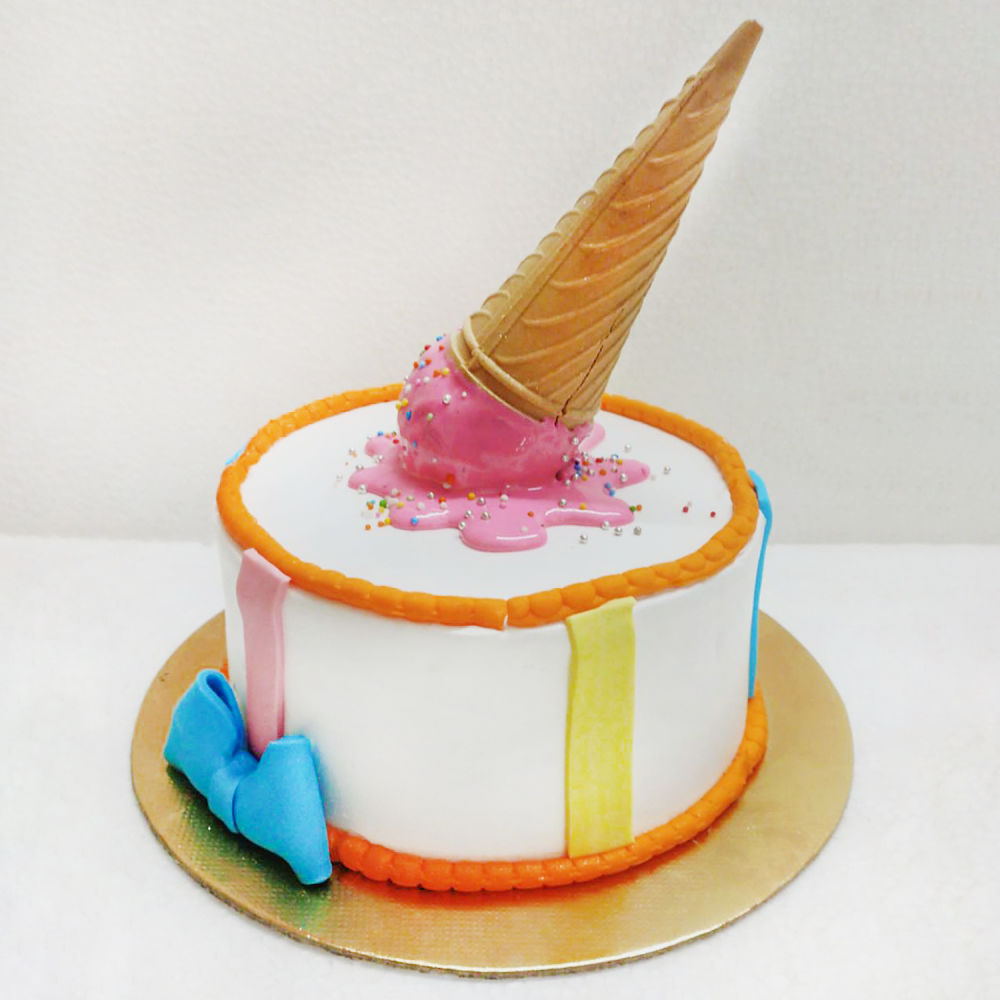 DIY Dripping Ice cream cone cake - Frosting and Glue- Easy crafts, games,  recipes, and fun