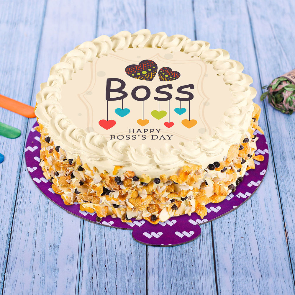 Boss Theme cake for a woman by Creme Castle