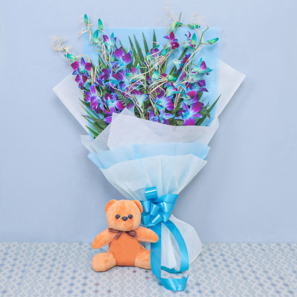 Buy Ravishing Blue Orchids With Teddy