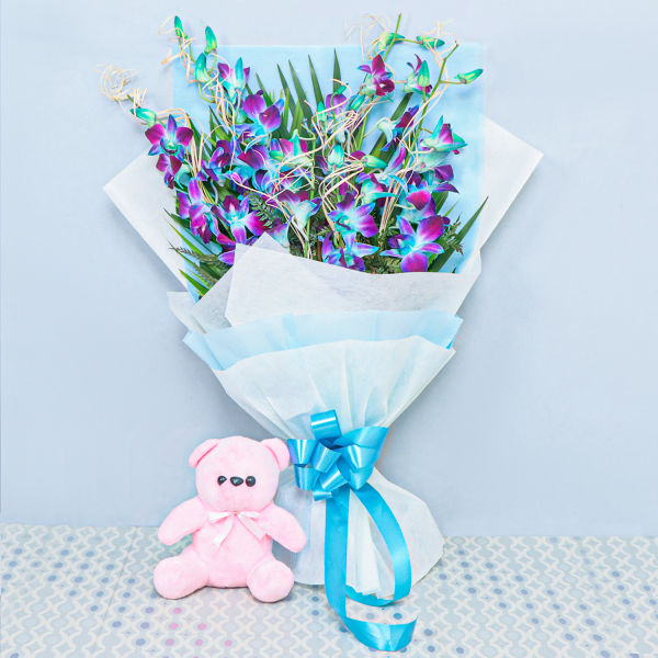 Buy Blooming Orchids Bouquet With Teddy