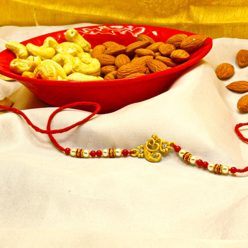 Buy Divine Rakhi With Kaju Badam Bites