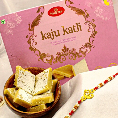Buy Ganesha Rakhi with Kaju Katli Treats