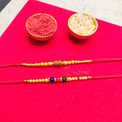 Buy Beads Rakhi Pair Set
