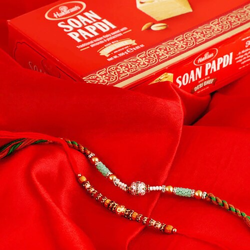 Buy Loveable Rakhis With Soan Papdi