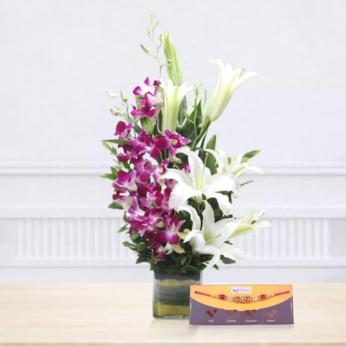 Buy Orchids N Lilies Bouquet N Bro Rakhi