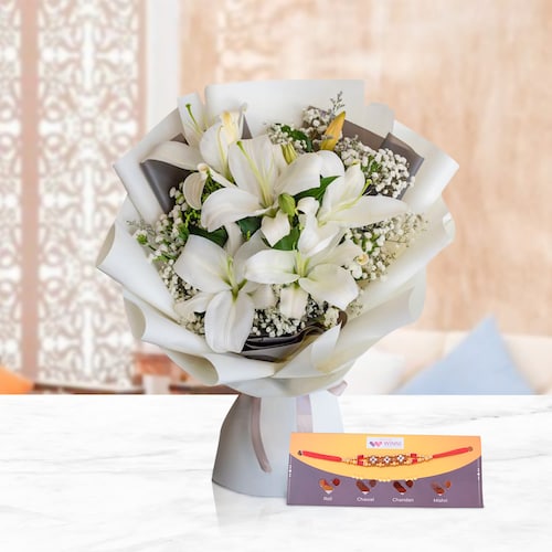 Buy Lilies With Filler Bouquet Rakhi Combo