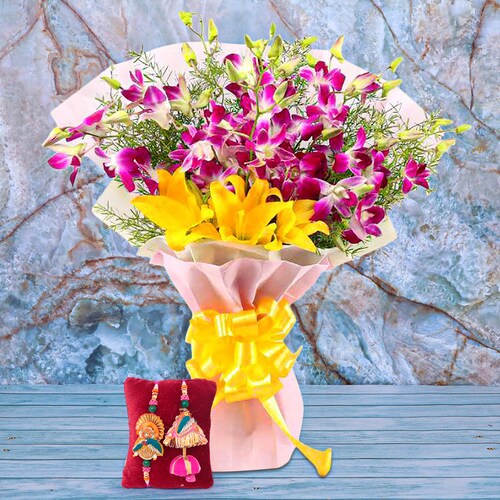 Buy Rakhi Set With Yellow Lilies N Orchids Bouquet