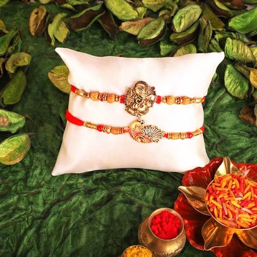 Buy Ganesha & Peacock Rakhis