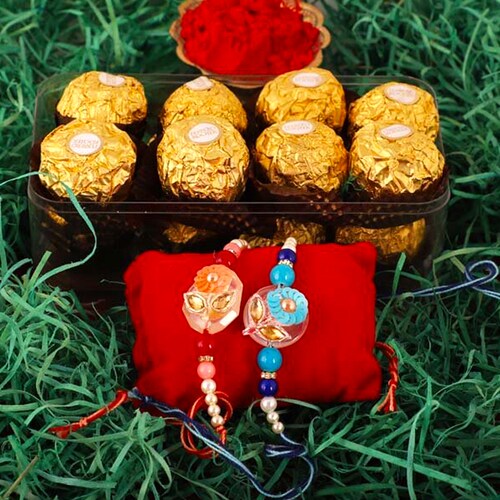 Buy Sequins Rakhi Pair & Ferrero Rocher