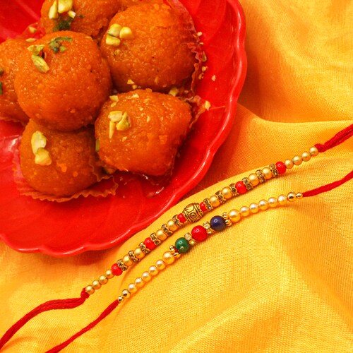 Buy Divine Rakhi Pair with Motichoor Laddo