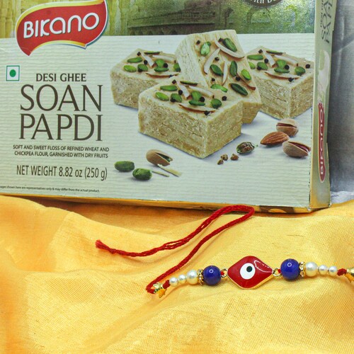 Buy Evil Eye Rakhi with Soan Papdi