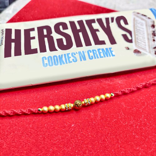 Buy Stunning Rakhi Combo with Chocolate Bar