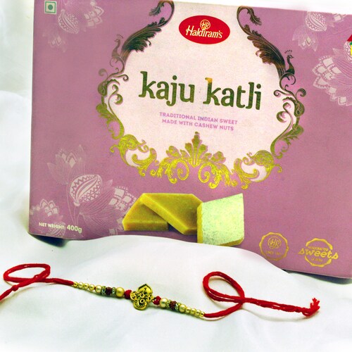 Buy Dazzling Rakhi with Kaju Mithai