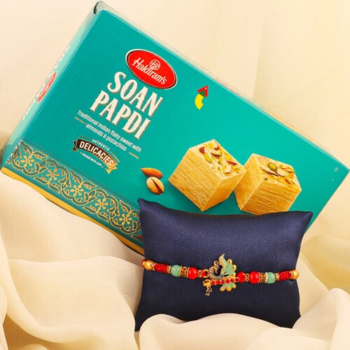Buy Enchanting Peacock Rakhi With Soan Combo