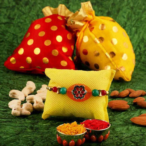 Buy Pebble Floery Rakhi With Almond N Cashew