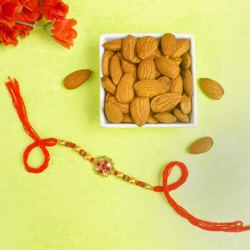 Buy Appealing Pink Diamond Rakhi with Almond Nuts
