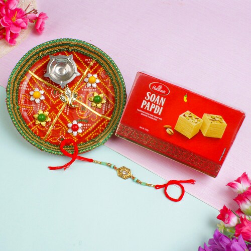 Buy Metal Diamond Rakhi with Puja Thali & Sweet Hamper