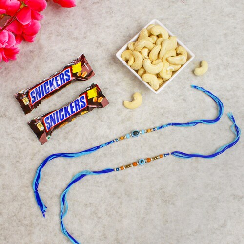 Buy Eye Catching Beads Rakhi Set with Chocolates & Cashew