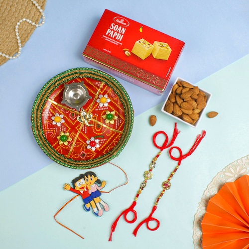 Buy Three Amazing Rakhis With Puja Thali Sweet Dry Fruit Hamper