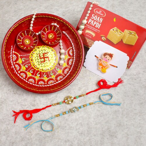 Buy Three Family Rakhi Set With Puja Thali Sweet Hamper