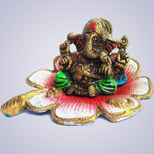 Buy White Metal Ganesha with Lotus
