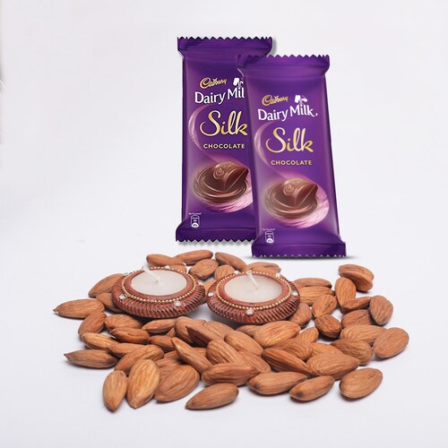 Buy 2 silk 100 gm Almonds and 2 Diyas