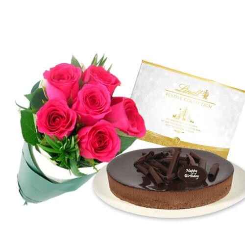 Buy Pink Roses with chocolate cheesecake and Lindt Festive Collection