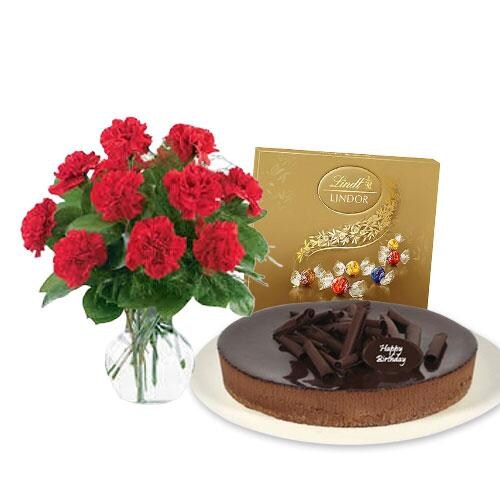 Buy Red Carnations with chocolate cheesecake and Lindt Assorted chocolates