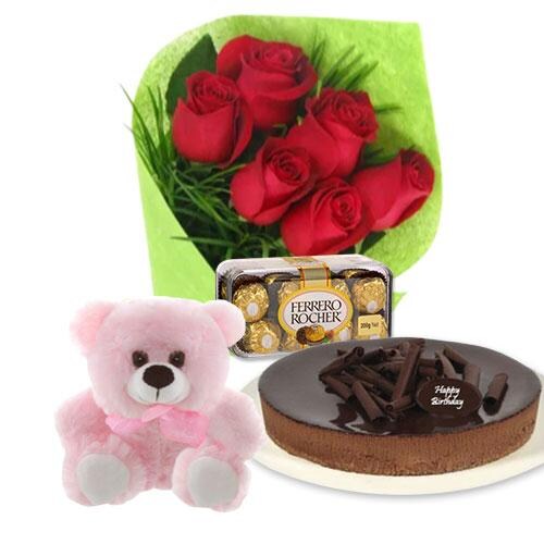 Buy Red roses with chocolate cheesecake and Ferrero Rocher and 6 inch Teddy