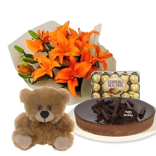 Buy Orange Lilies with Chocolate Cheesecake and Ferrero Rocher and 6 inch Teddy