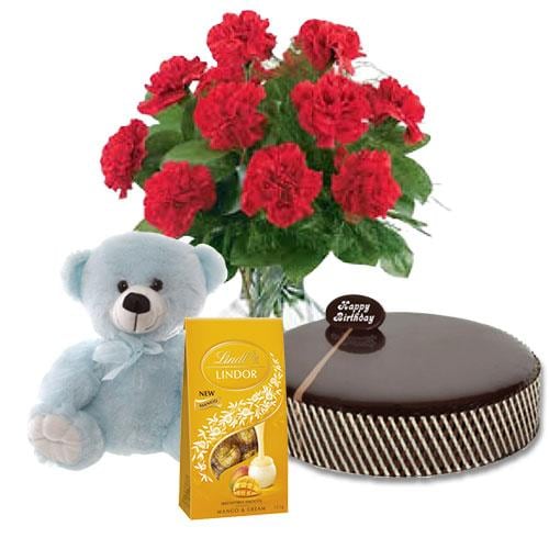 Buy Chocolate Mud Cake with Red Carnations and Lindt Mango Chocolates and 8 inch Teddy