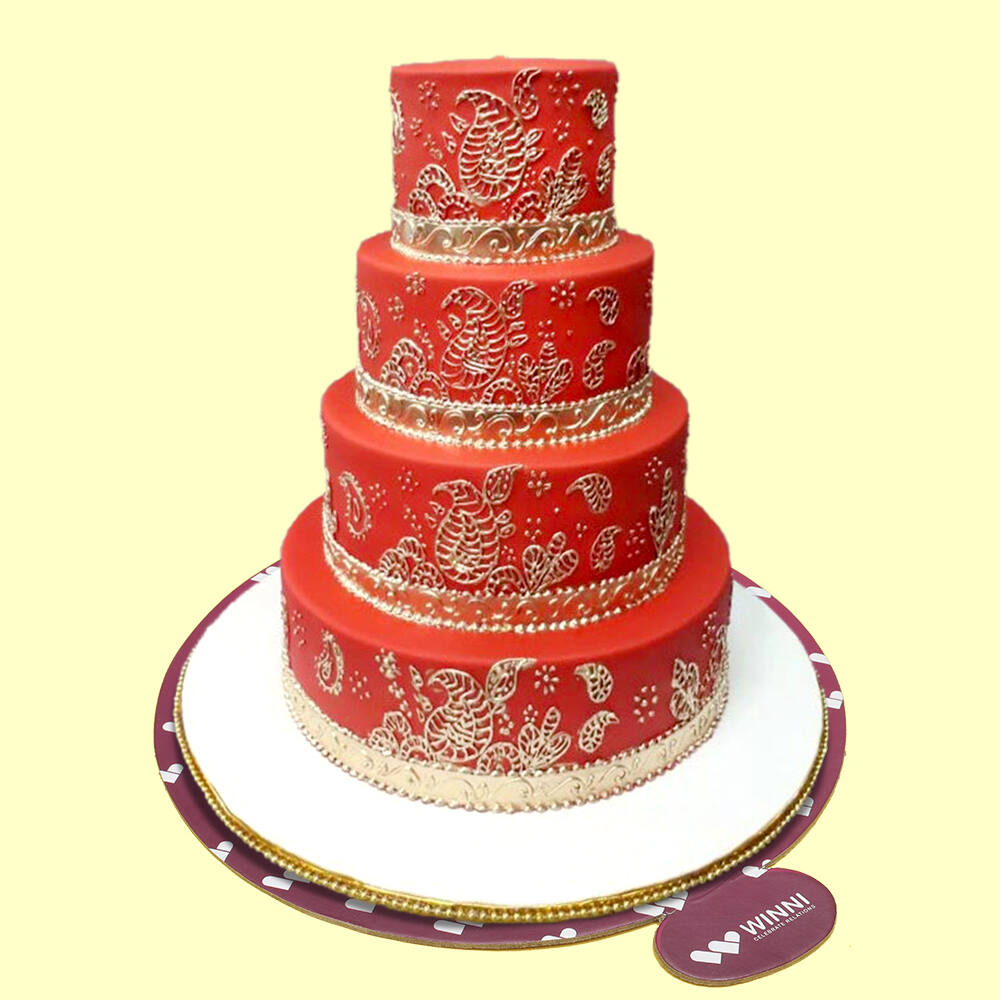 Three tiered wedding cake with red rose confection Stock Photo - Alamy