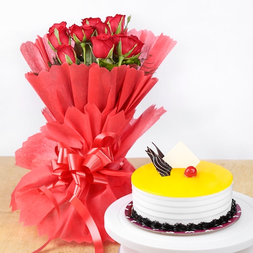 Buy Pineapple Cake and Red Roses