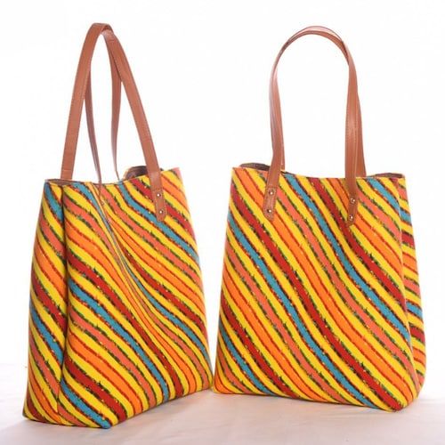 Buy Multi Colored Striped Bag