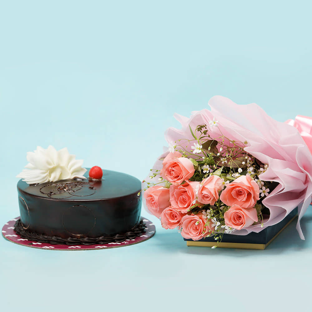 Send Online 1 kg eggless dry fruit chocolate cake n carnation bouquet Order  Delivery | flowercakengifts