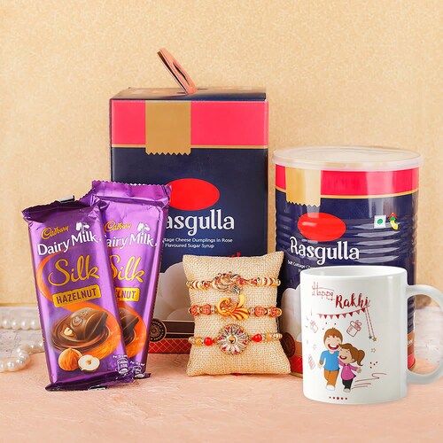Buy Set Of 3 Rakhis With Adorable Mug Rasgulla & Cadbury Silk
