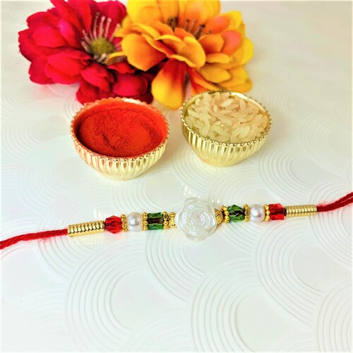 Buy White Flower Rakhi