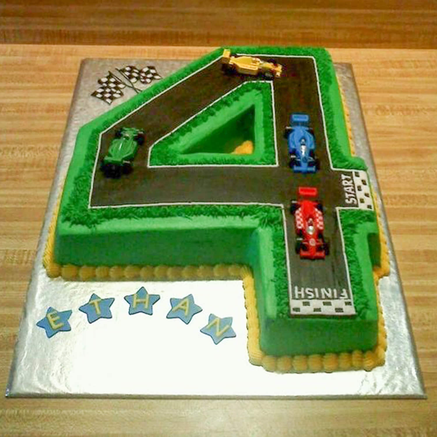 Car/race track cake | Race track cake, Cars birthday cake, Cake designs for  kids