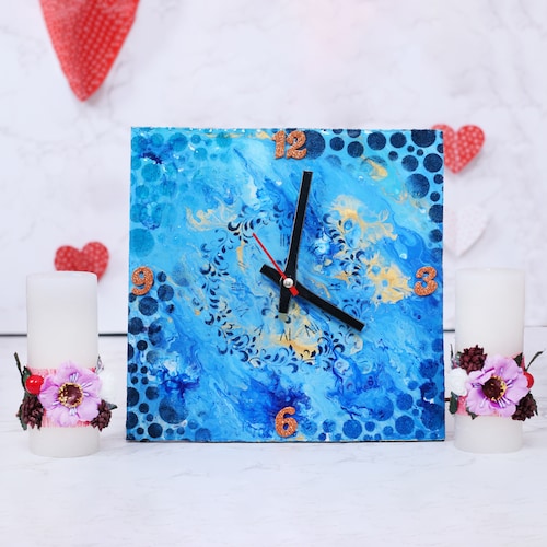 Buy Pink flower pillar candle with Blue Sky Clock