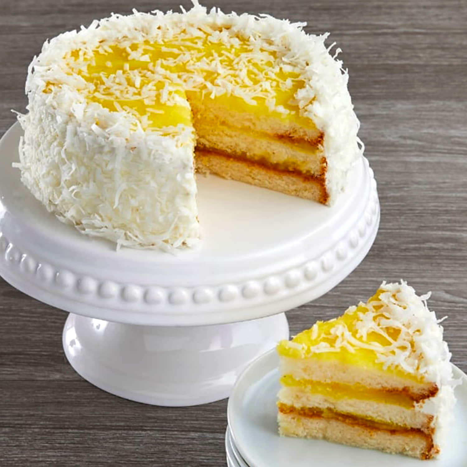 Banana and coconut cake with lemon icing recipe - Recipes - delicious.com.au