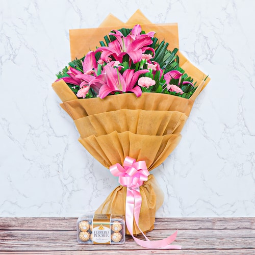 Buy Classy Ferrero Lilies N Carnation Bouquet