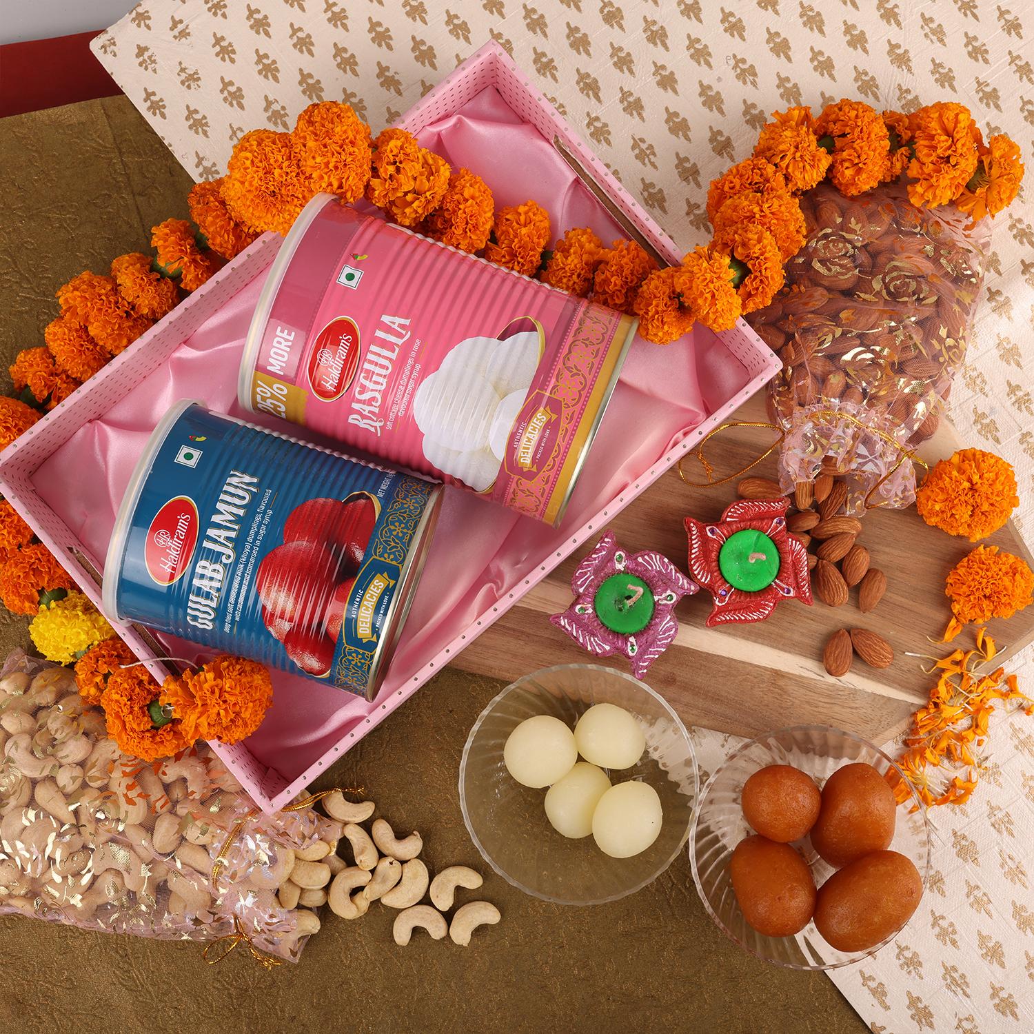 Holi Gift Hamper - Haldiram Soan Papdi, Lindt Lindor Chocolate with Holi  Color - Indian Gifts Valley