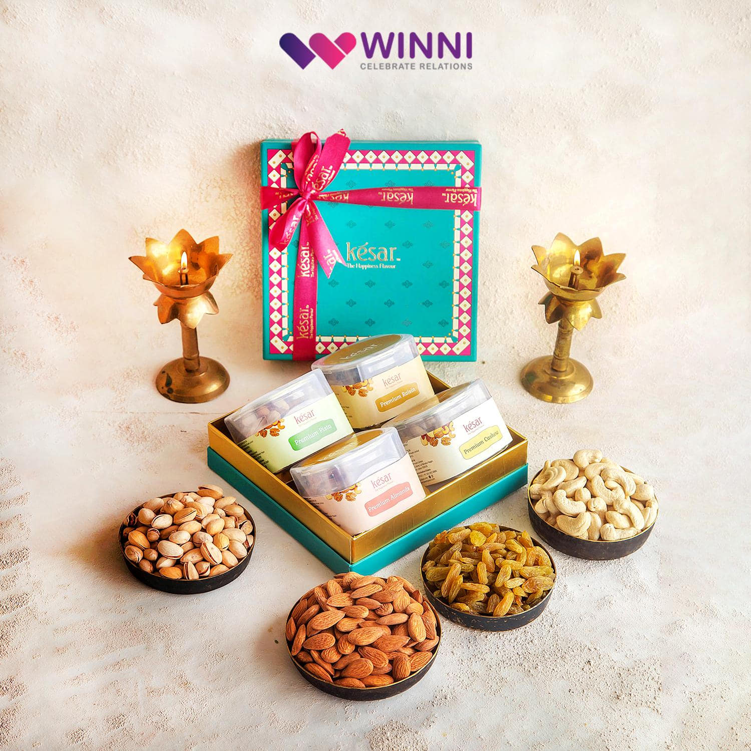 This Diwali Gift Pack contains: Kiwi Slices 125g, Mango Slices 125g,  Pineapple Rings 125g, Apricots 125g, Black Pepper & Mint Cashew 125g,  Roasted Cashew & Almond Mix 125g. – RawFruit®
