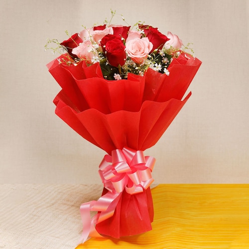 Buy Mixed Roses In Red Paper Packing