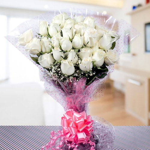 Buy 20 White Roses In Cellophane Packing