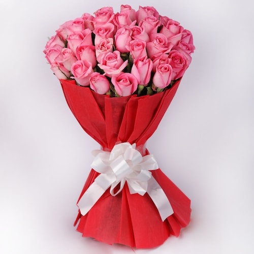 Buy Pink Roses Wth Red Paper Packing