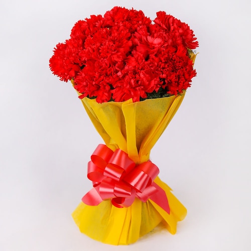 Buy Red Carnations WithYellow Paper Packing