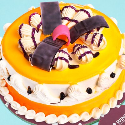 Send Mango Cake Online | Mango Cake Delivery by Winni