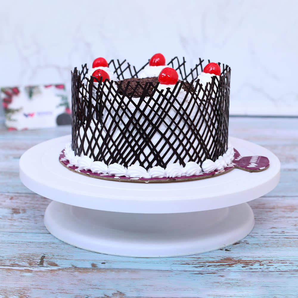 Buy/Send Yummy Dripping Black Forest Cake Online » Free Delivery In Delhi  NCR » Ryan Bakery